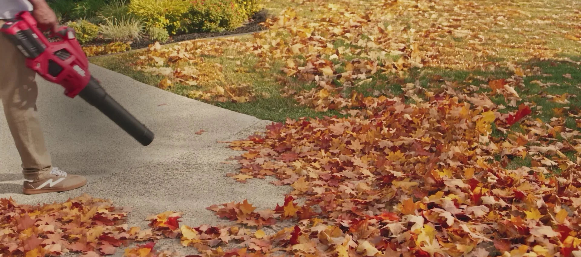 SKIL leaf blower clearing autumn leaves